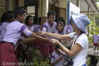 Gunard giving gifts to school kids on Banda Island